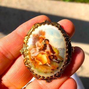 Antique brooch. Hand painted. Gold leaf covered.